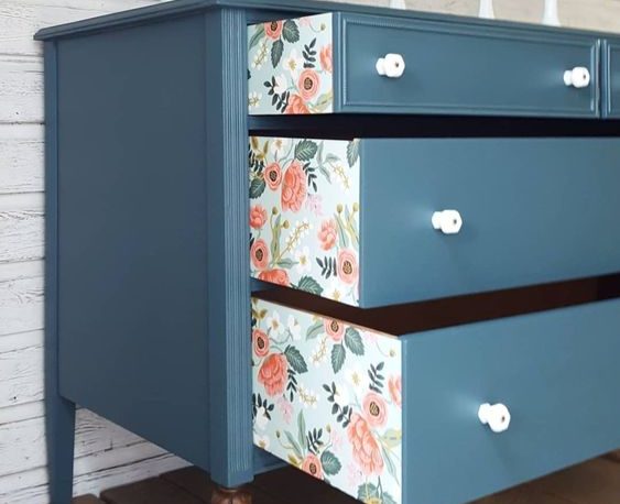 Line your drawers with wallpaper